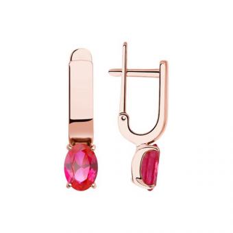 Женские золотые серьги с красными корундами 585 пробы 