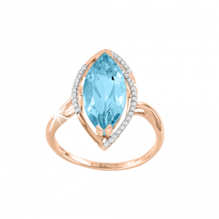 A beautiful women's ring made of 585 gold with cubic zirconia and topaz