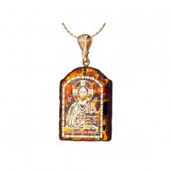 Pendant icon of natural amber with the gilded face of the Almighty God
