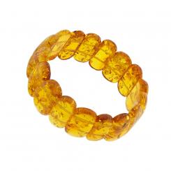 Stretch bracelet from natural amber stones in honey color