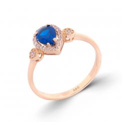 Ladies' ring in 585 rose gold with blue sapphire and colorless zirconia