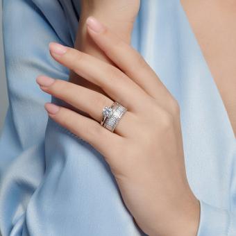 Ladies' ring in 925 silver, with 39 zirconia and white enamel, width approx. 12 mm