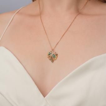 Blattförmiger Anhänger aus  Rotgold 585 mit farblosen, gelben und grünen Zirkonia