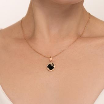 Auffälliger Anhänger aus Rotgold 585 mit Onix - Durchmesser ca. 12 mm, Höhe ca. 22 mm